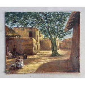 Village africain, huile sur toile, signature à identifier