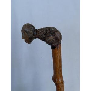 Art populaire, canne avec pommeau anthropomorphe 