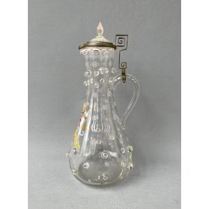 Aiguière en verre ornée d'un blason