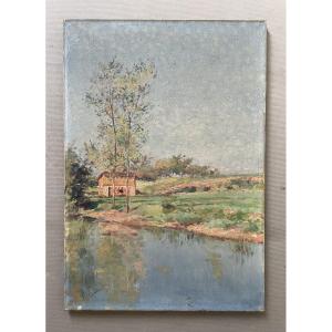 Paysage en bord de rivière, signature à identifier
