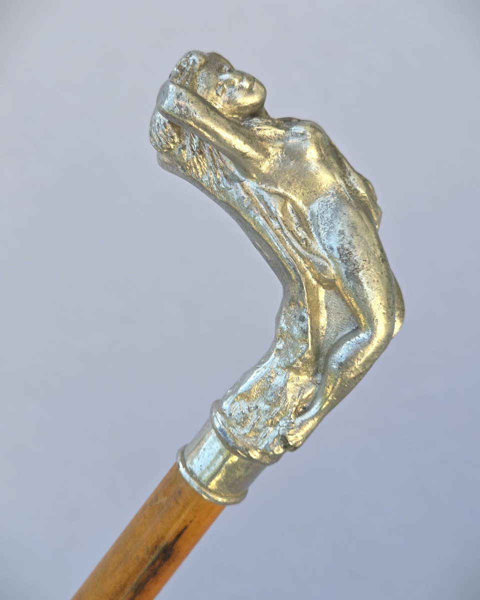 Cane With A Metal Handle Depicting A Reclining Woman