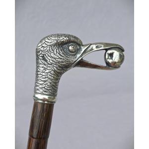 Canne casse-tête, pommeau en bronze argenté à décor d’oiseau