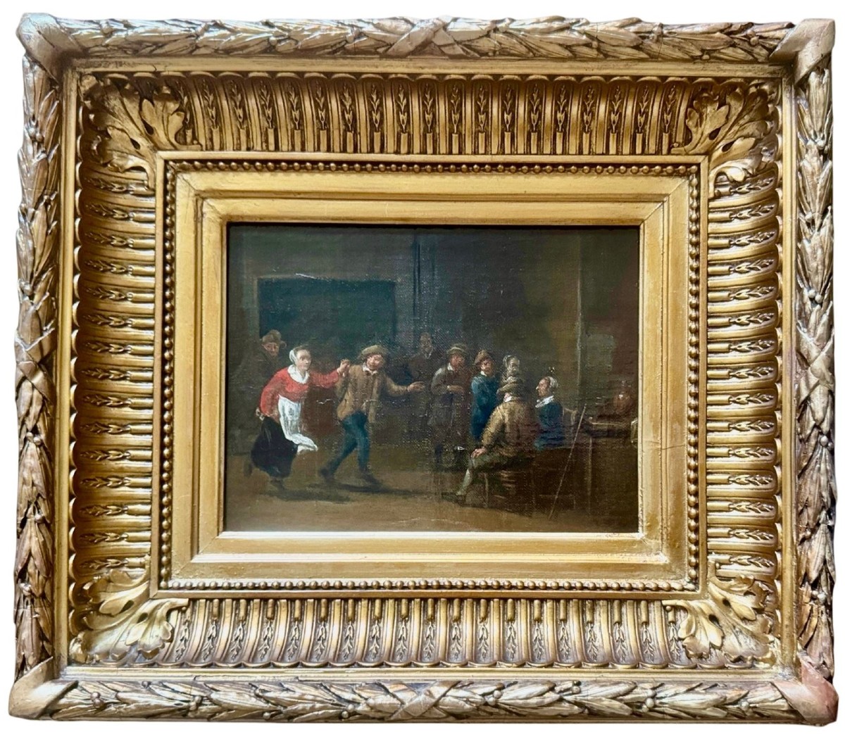 A 17th Century Dutch Tavern Scene With A Woman Dancing 