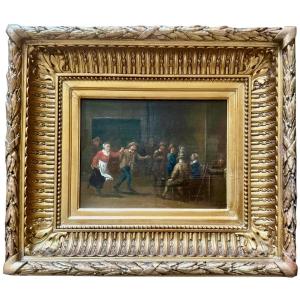 A 17th Century Dutch Tavern Scene With A Woman Dancing 