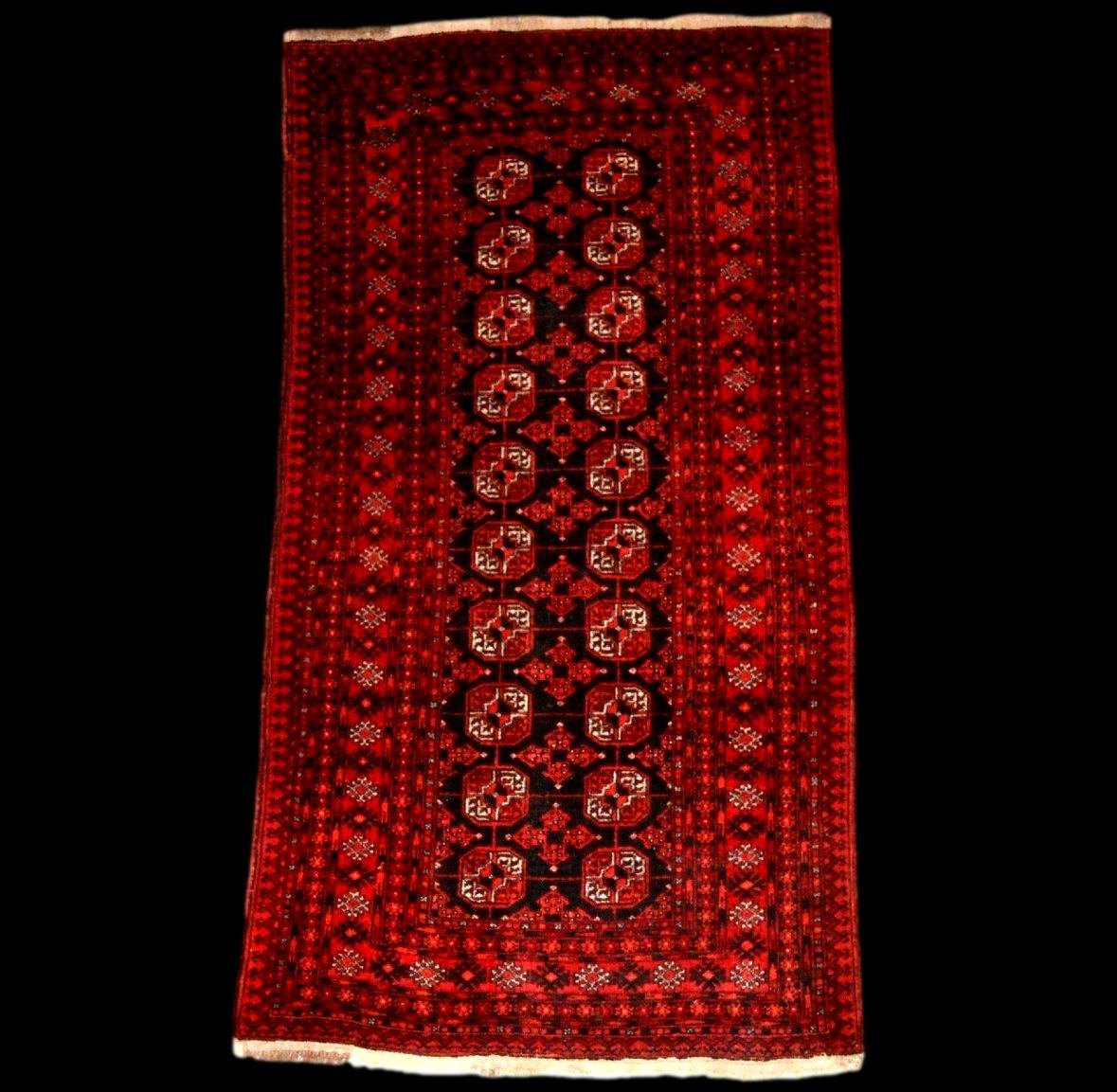 Tapis Afghan, 100 x 192 cm, laine sur laine nouées main en Afghanistan vers 1970, parfait état