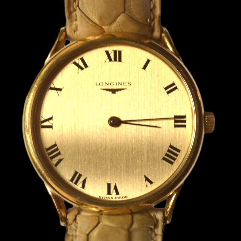 Longines, montre homme  maison Longines en or 18 K, vers 1980