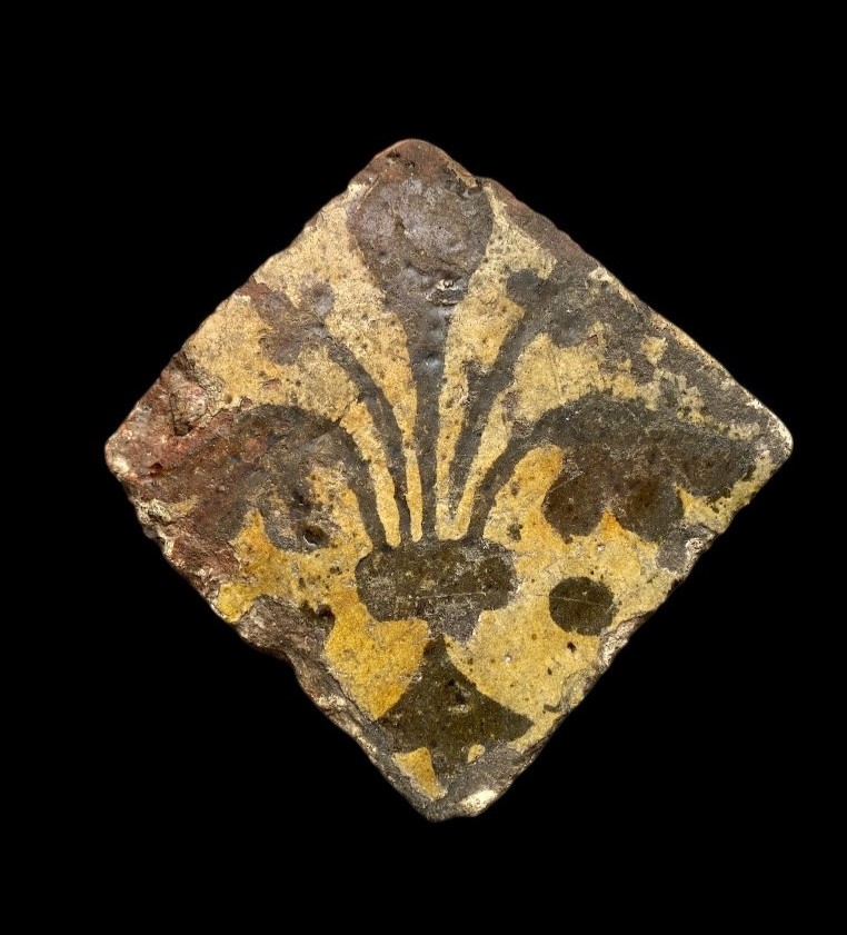 A Bright Yellow 'fleur-de-lis' Pavement Tile, 14th Century