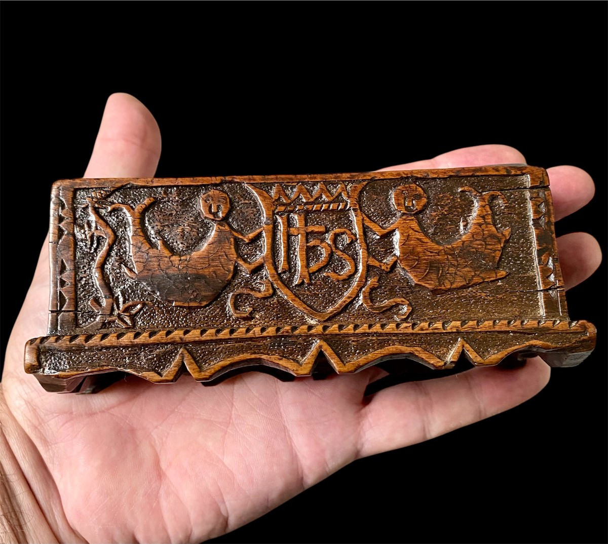 An 18th Century Boxwood Box With Sea Creatures Wearing Armored Shields