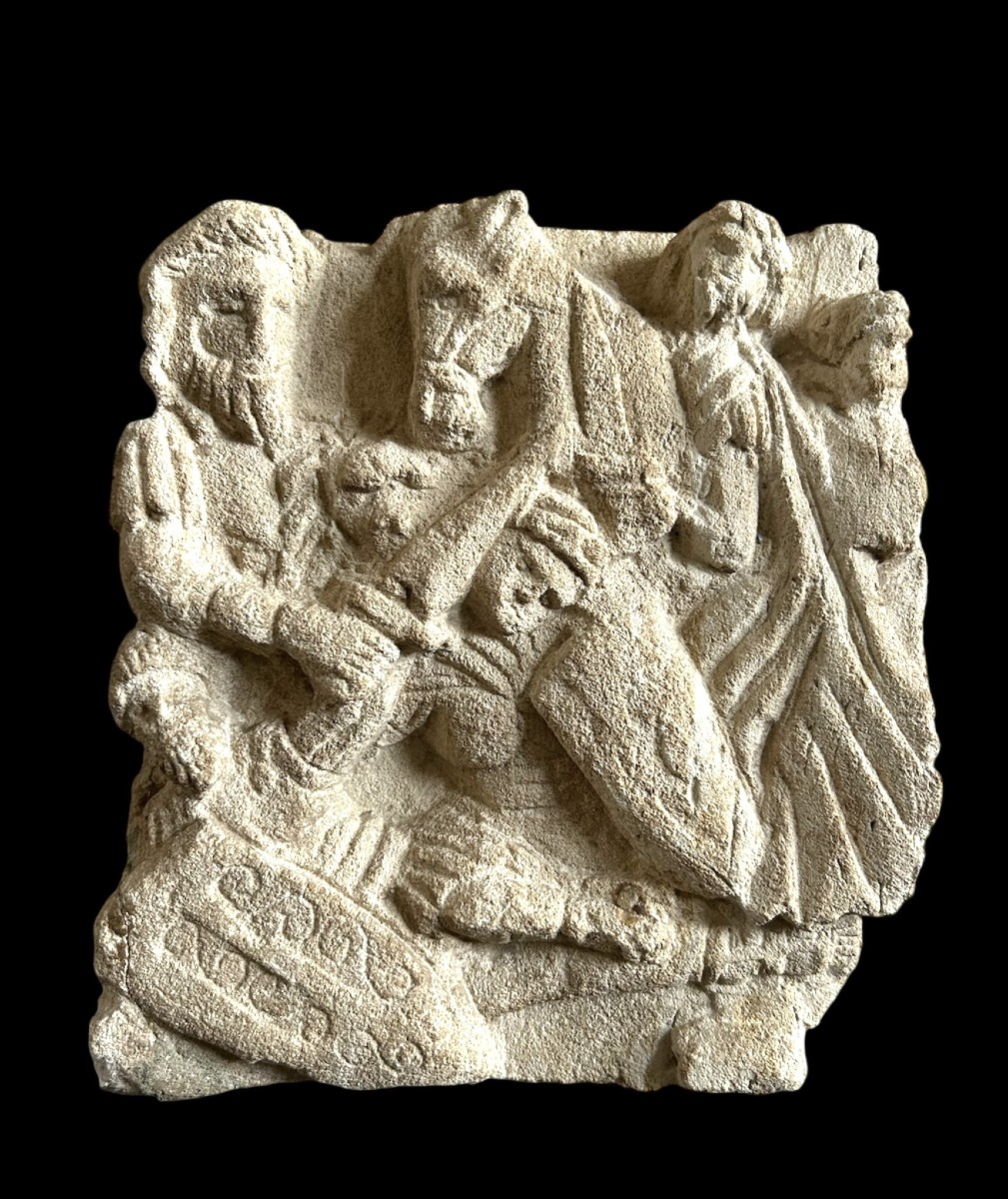 A French Fragment Of A Limestone Frieze With A Battle Scene, 12th-14th Century A.d.