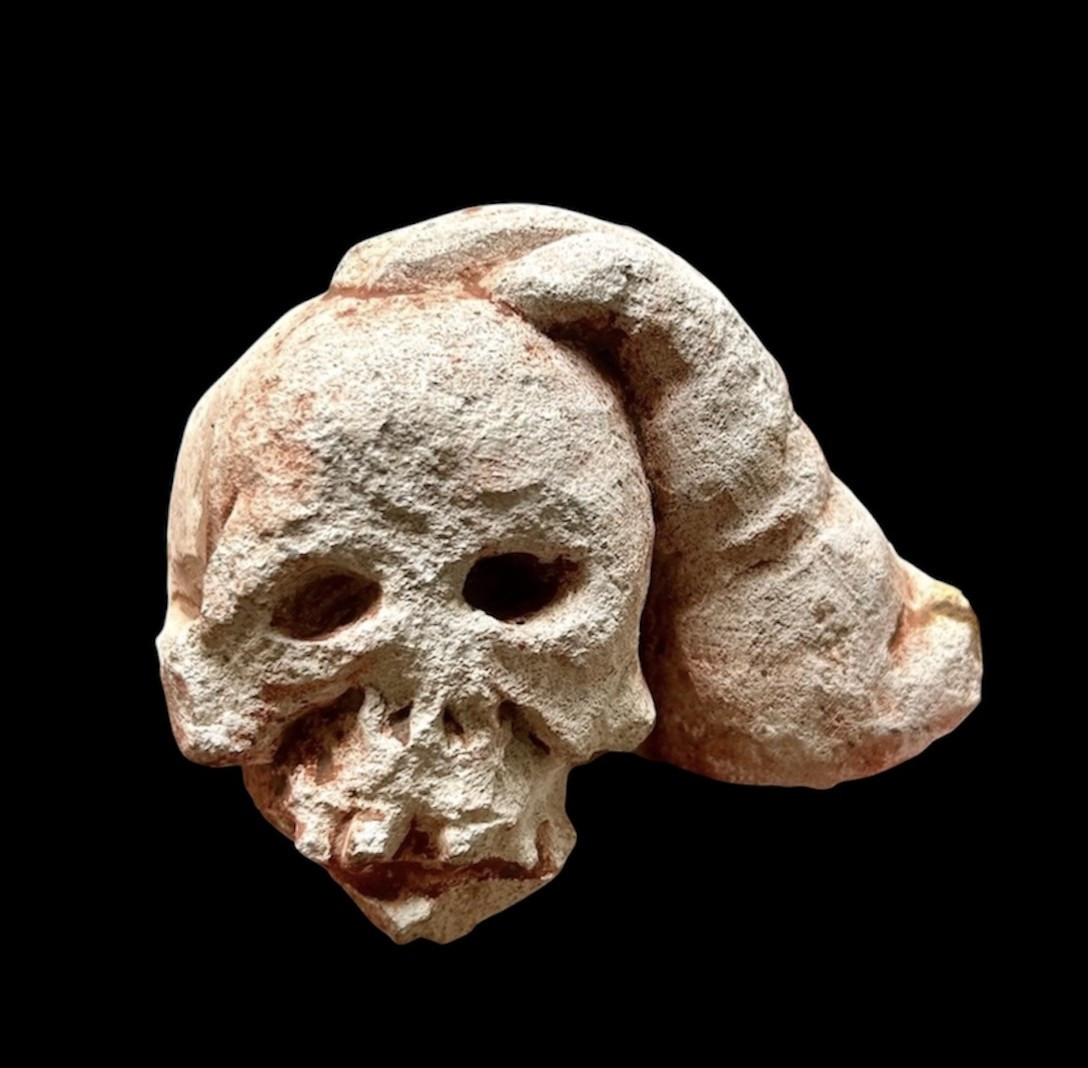 Large Memento Mori Skull Supported By A Hand, Carved Stone, 16th-17th Century
