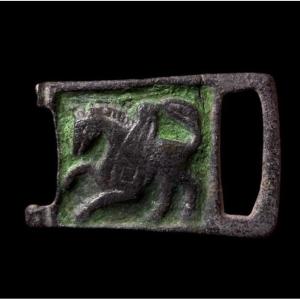 A 7th-8th Century Silver And Enamel Belt Buckle With Pegasus