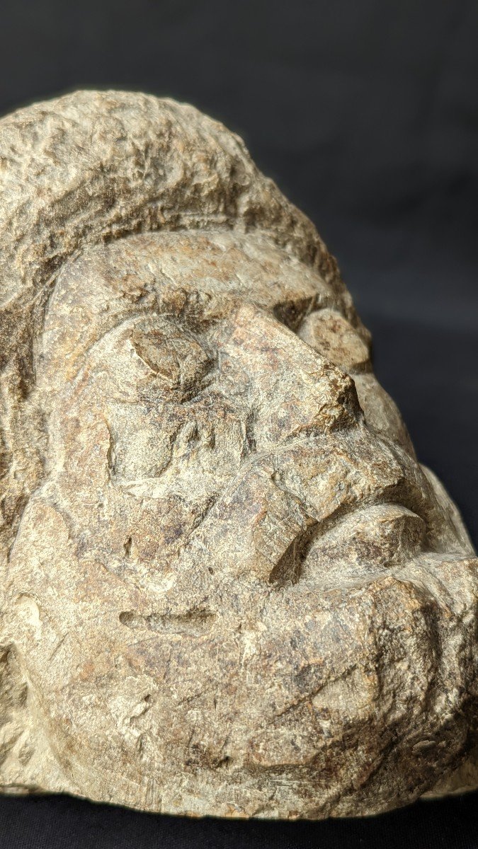 Ancient Stone Head Smooth Eyes Enigma