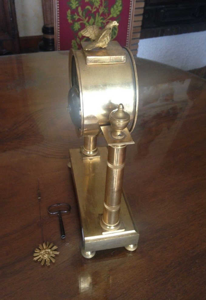 Pendule en bronze doré, époque Empire-photo-2