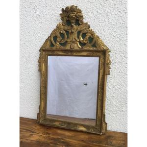 Mirror In Carved And Gilded Wood