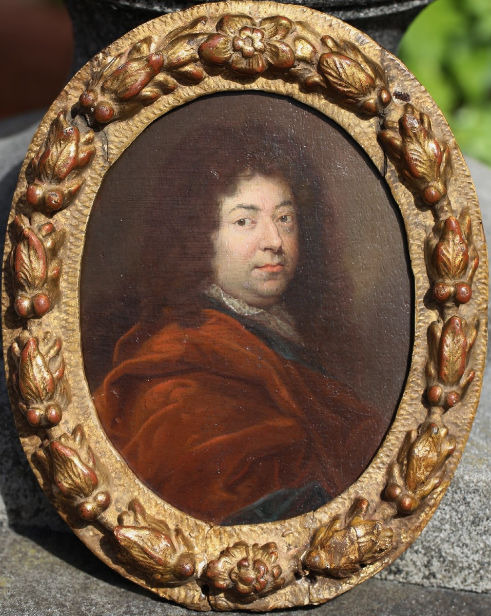 French School, Early 17th Century, Portrait Of A Man In A Red Coat, Oil On Panel, Oval View.