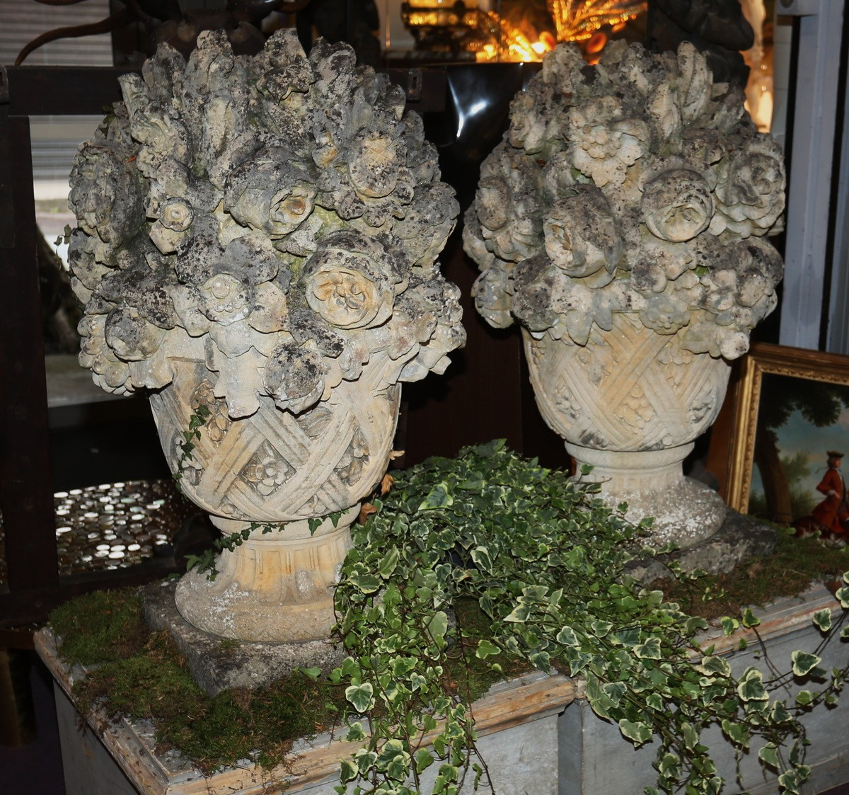 France XIXème dans le style du XVIIIème,  paire d'importants vases fleuris en pierre sculptée.