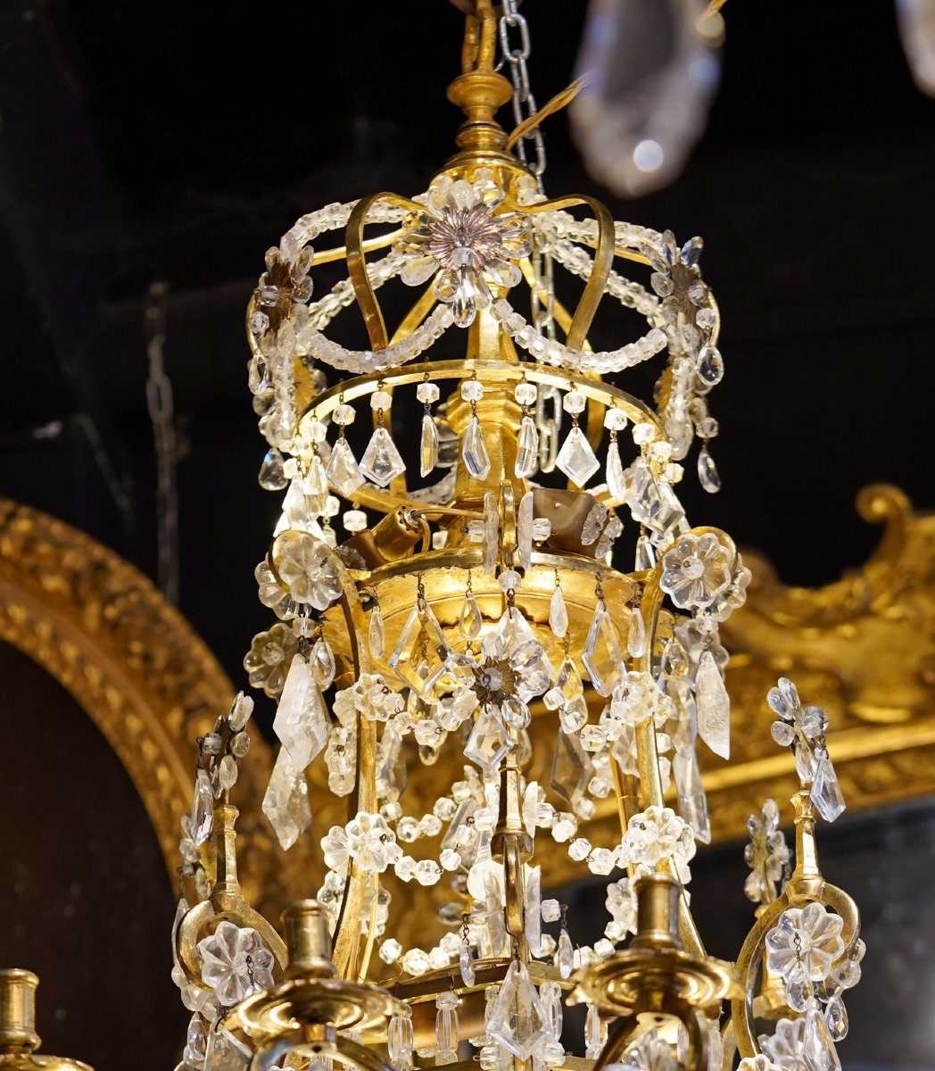 Italie époque début XVIIIème, lustre en métal doré et cristaux de roche.-photo-1