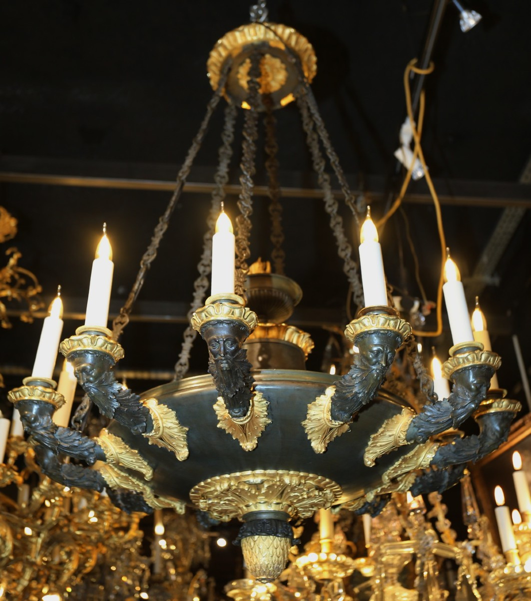 Empire Period Chandelier With 12 Lights In Gilt And Patinated Bronze.