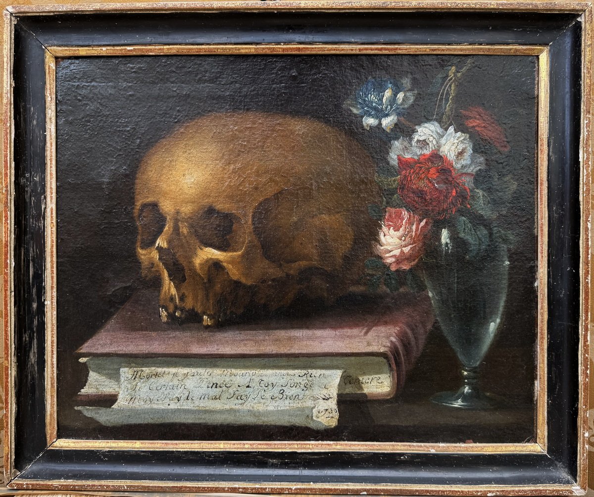 Teniere, Active In The 18th Century; A Vanitas Painting Featuring A Skull, A Book, And Flowers, Signed “tenière” And Dated 1735