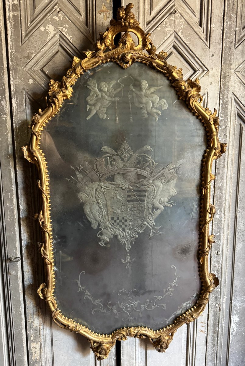 Miroir en bois doré et miroir gravé et armorié, Venise époque XVIIIème