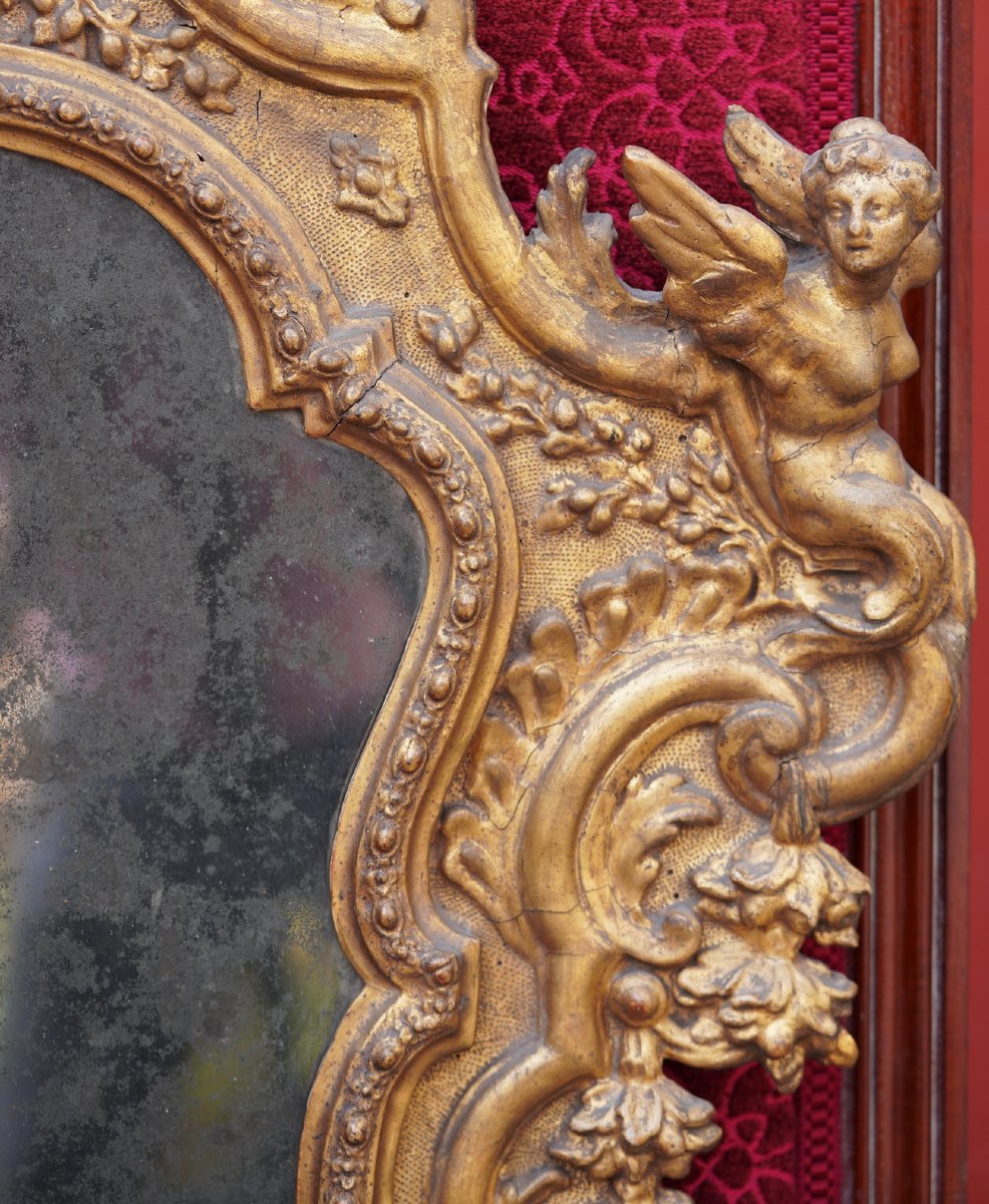 Italie époque XVIIIème, paire de miroirs de forme violonnée,  en bois et stuc doré -photo-1