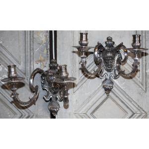 Paire d'appliques en bronze argenté de style Régence époque XIXème, masque homme barbu.