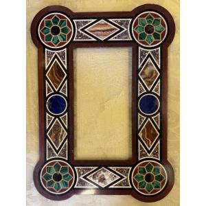 Florence XIXème, cadre en pierre dure marqueterie de marbre lapiz et malachite.