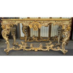 Paire de tables consoles Régence en bois sculpté et peint rechampi or dessus marbre