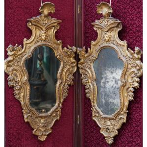 18th-century Italy, A Pair Of Violin-shaped Mirrors, Made Of Wood And Gilded Stucco