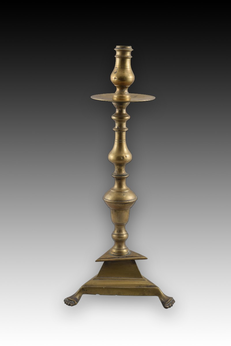 Candlestick With Triangular Base. Bronze. Spain, 18th Century. 