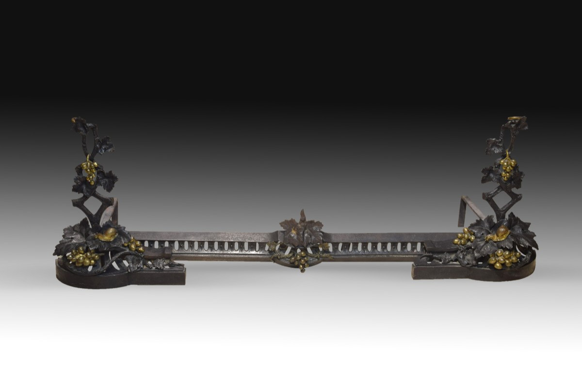 Pair Of Andirons. Blued And Gilded Bronze, Iron. 19th Century. 