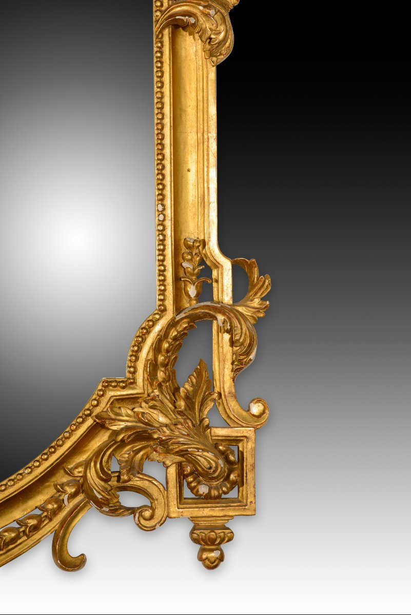 Miroir. Bois sculpté et doré. XXe siècle. -photo-3