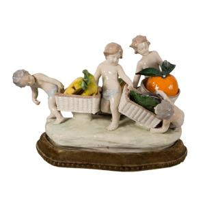 Children With Fruit Baskets, On Base. Glazed Porcelain. Probably Capodimonte,