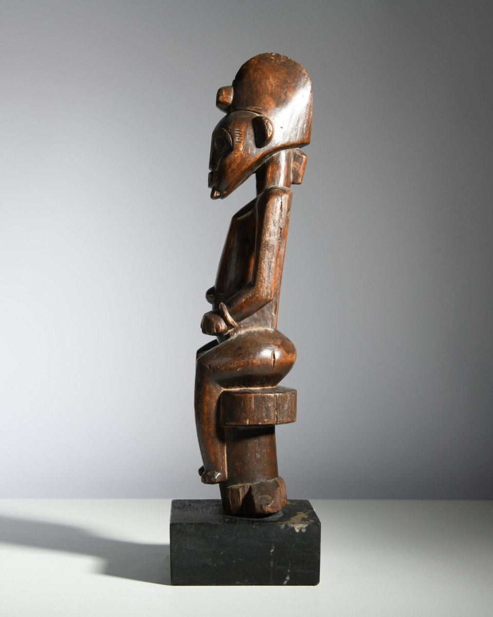 Seated Male Statue Of A Senufo Pombibele-photo-1