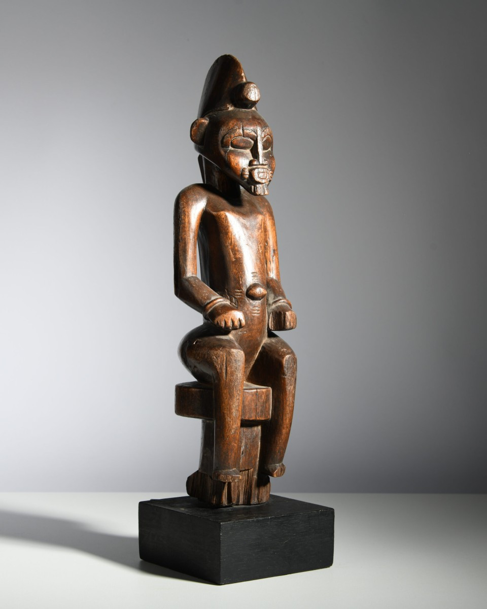 Seated Male Statue Of A Senufo Pombibele