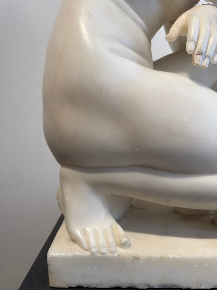 Sculpture Depicting A Crouching Venus, Carved From Carrara Marble—20th Century. Italy -photo-1