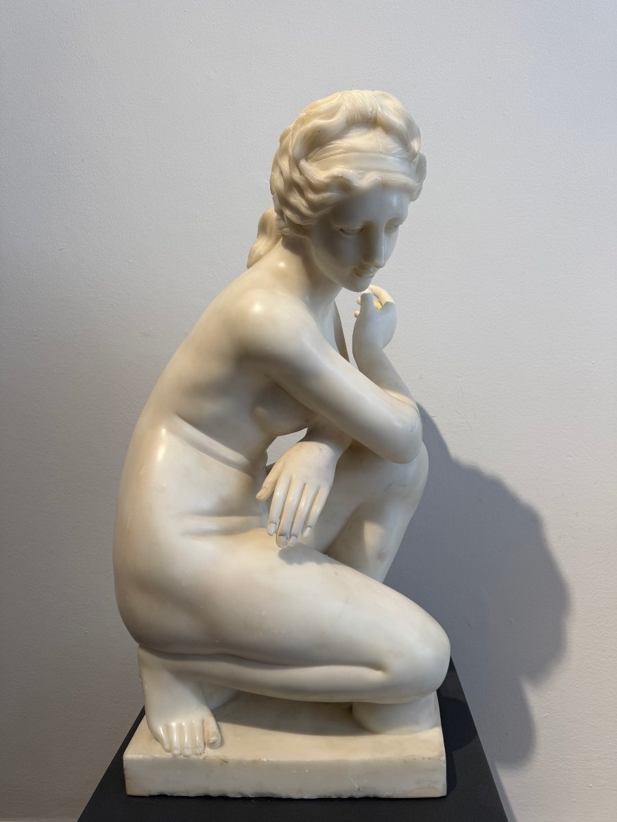 Sculpture Depicting A Crouching Venus, Carved From Carrara Marble—20th Century. Italy 