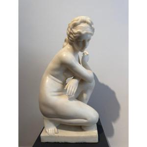 Sculpture Depicting A Crouching Venus, Carved From Carrara Marble—20th Century. Italy